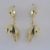 Gold and jade opening pod earrings