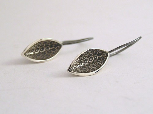 Silver half-pod hook earring with fish eggs