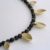 Gold and onyx multiple half-pod necklace